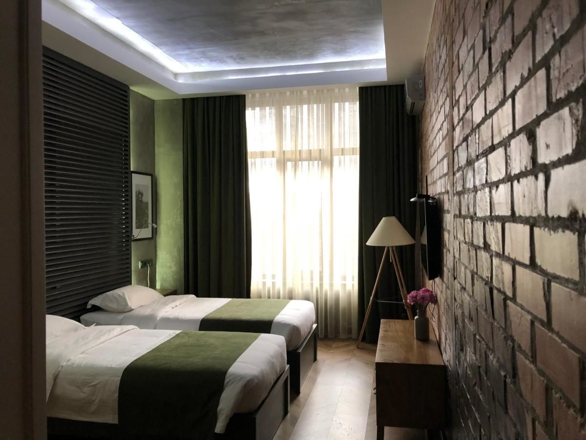 Отель Bugu Hotel Bishkek Бишкек