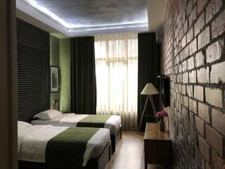 Отель Bugu Hotel Bishkek Бишкек Бюджетный двухместный номер с 2 отдельными кроватями-7